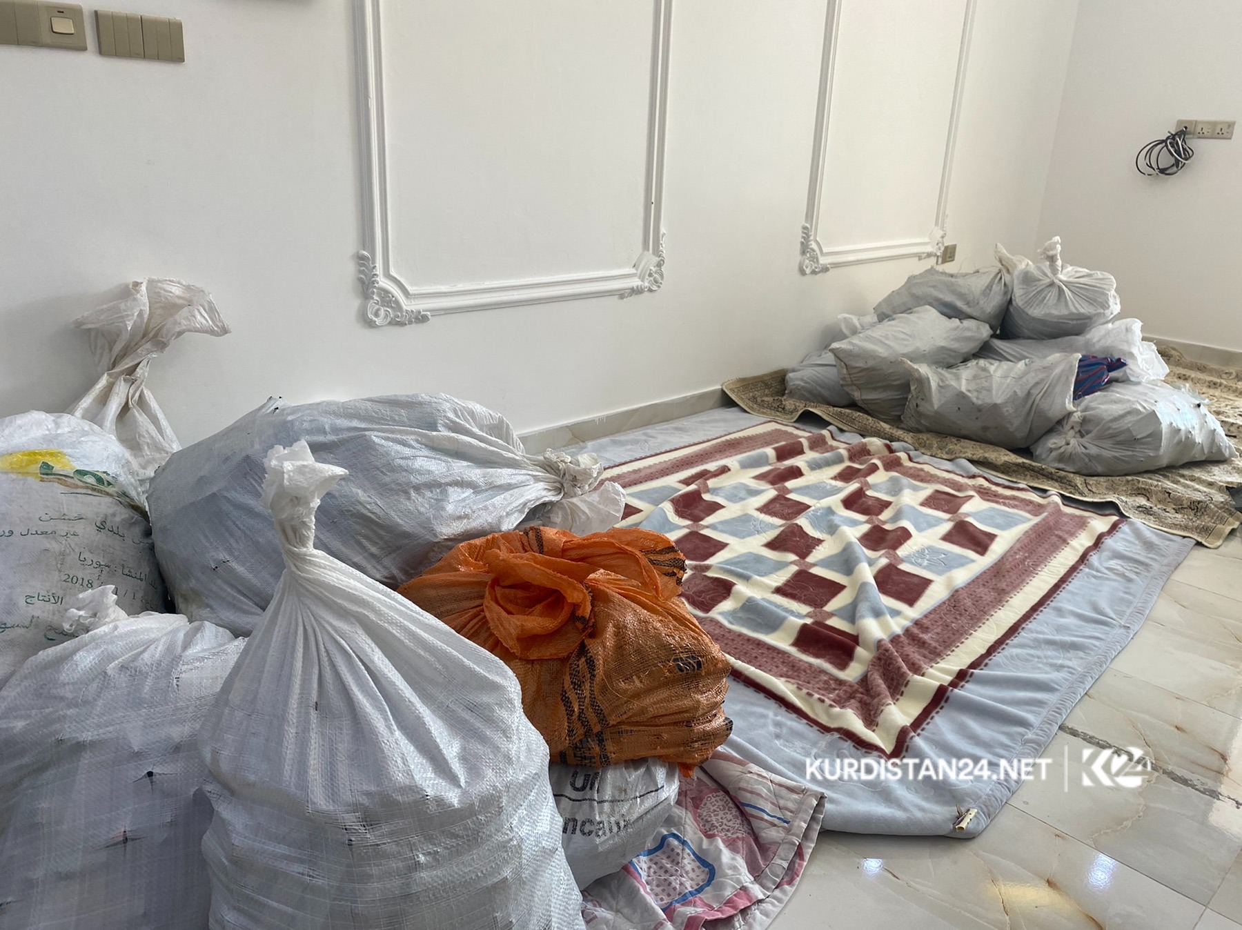 بەوێنە... دەمانچە قاچاغە دەستبەسەرداگیراوەکانی ماڵەکەی هەولێر
